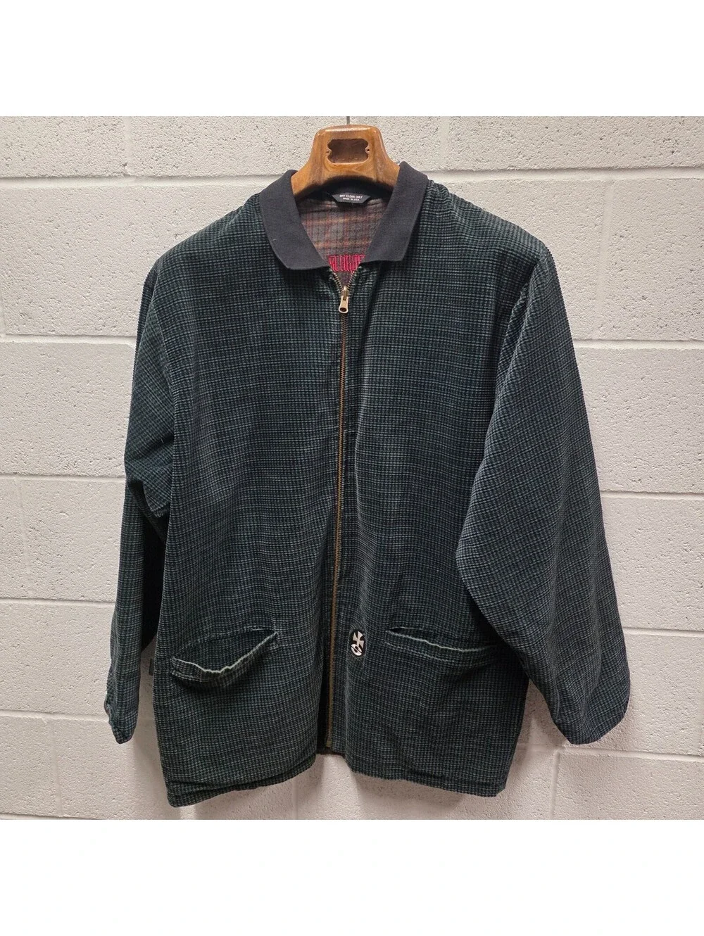 Schroff corduroy jacket features a distinctive green checkered pattern 25x34
